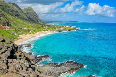 View overlooking Makapuu Beach on Oahu, Hawaii and beyond the turquoise ocean water